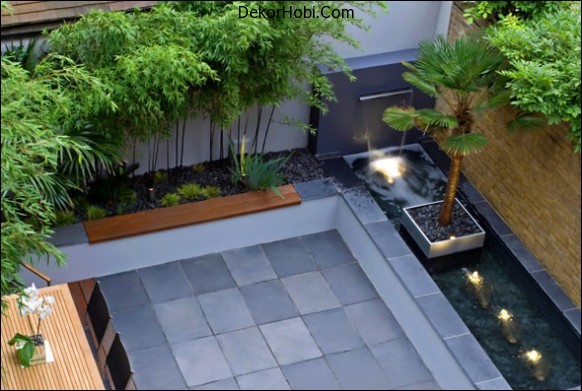 contemporary-couryard-water-feature-bamboo-grass