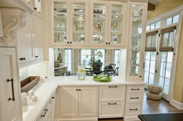 Glass-front-kitchen-cabinets-set-in-a-wooden-frame