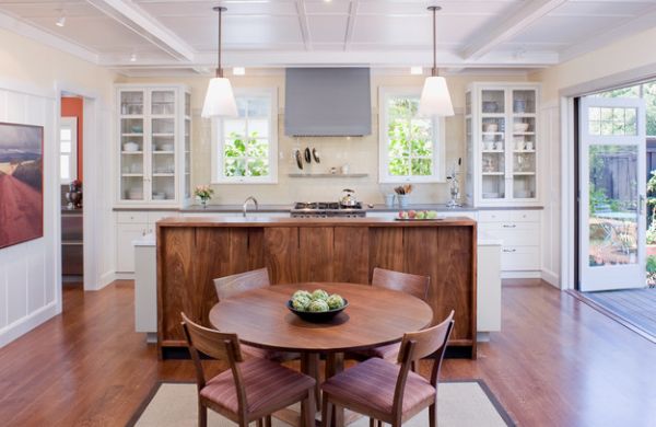 Glass-shelves-on-either-side-bring-symmetry-to-this-kitchen-in-white