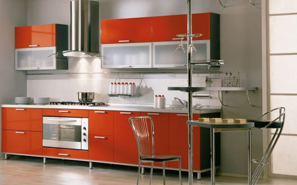 Orange-modern-kitchen-with-stylish-glass-cabinets