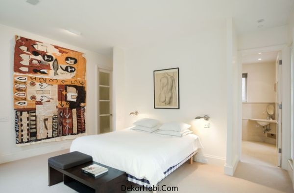 Low-mounted-sconces-free-up-space-for-wall-art